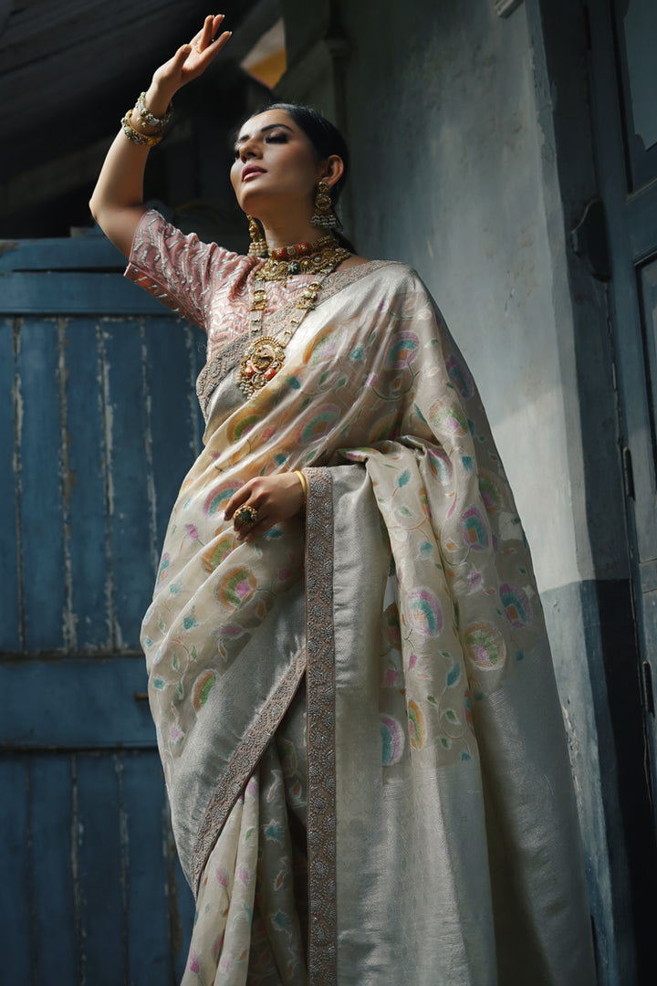 Striking Beige Color Organza Weaving Work Designer Festive Wear Saree With Fancy Blouse